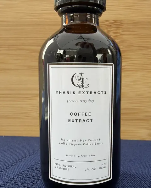 Finished 2 fl oz bottle of Charis Extracts Coffee Extract with its label
